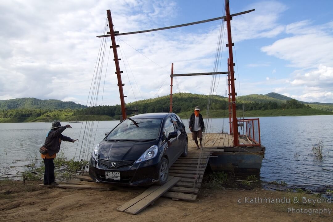 Crossing-the-resovoir-on-the-Sirikit-Dam-at-Pak-Nai-Thailand-15