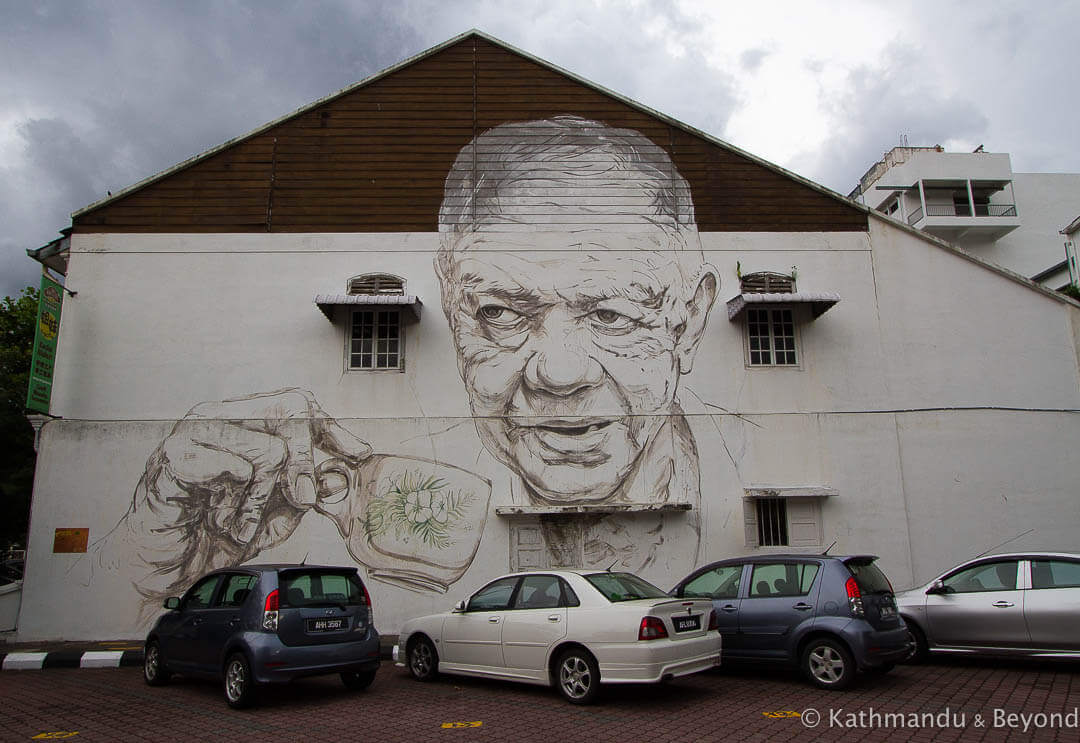 Old Uncle Drinking Coffee - Ernest Zacharevic Street Art in Ipoh, Malaysia