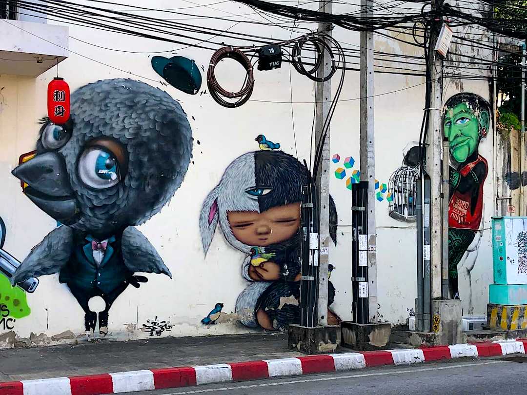 Mue Bon, Alex Face and Mr Ogay at the Freebird Cafe. Street Art Chiang Mai, Thailand